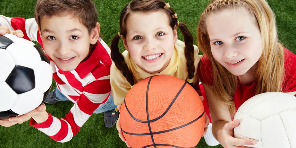 Group of children with sport balls
