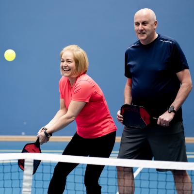 Couple playing Pickleball at Comber Leisure Centre