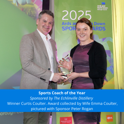 Emma Coulter collecting the Sports Coach of the Year award for husband, Curtis Coulter.